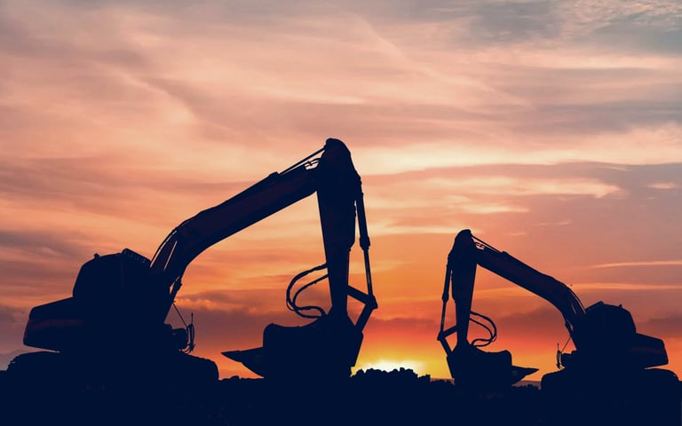 Skid steer loader on dirt path